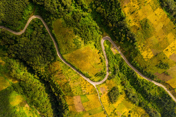 Aeriel view of curvy road in Guatemala volcanic farmland