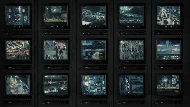 CCTV Screens Showing City At Night