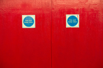 Fire exit keep clear red blank door