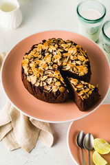 Gluten-free and vegan chocolate almond paleo cake on the table.