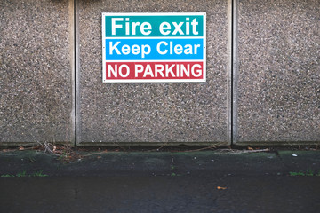 Fire exit keep clear no parking sign