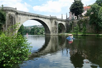 Fototapeta premium Pedal boat and bridge reflections