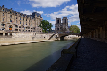 Obraz premium Paris, France - April 23, 2018: Paris with Notre Dame Cathedral and the bank of river Seine