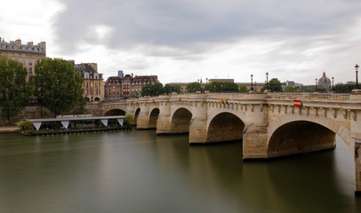 Paris, France - May 25, 2018: Pont Neuf in central Paris. The Pont Neuf is the oldest standing bridge across the river Seine in Paris