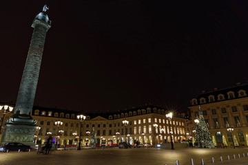 Paris, France - December 17, 2017: Christmas trees and illumination at Place Vendome in Paris by night