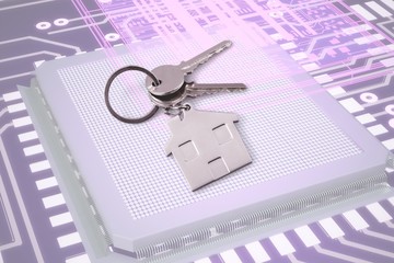 House keys with trinket on wooden background