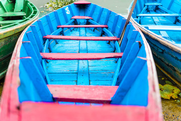 Fototapeta na wymiar Detail of colourful boat on Phewa lake in Pokhara, Nepal