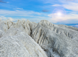 A rocky mountain or pile of fine white stone, which was mined from the mining process