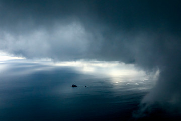 Alone island with the heavy storm