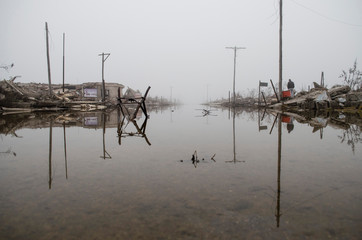 People watching the flood in Epecuen, Buenos Aires, Argentina