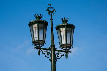 Fototapeta na wymiar Old street lamp at Commerce Square (Praca do Comercio. Lisbon, Portugal.