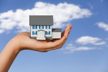 Building, mortgage, real estate and property concept - close up