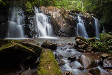 Fototapeta premium Water of the stream in the natural, Beautiful waterfall in forest.