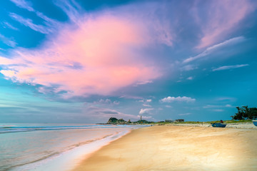 Landscape of sandy beach in the morning with dramatic sky beautiful welcomes new day