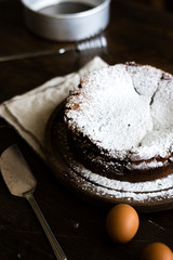 Chocolate fudge cake with icing sugar photography recipe idea