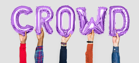 Hands holding crowd word in balloon letters