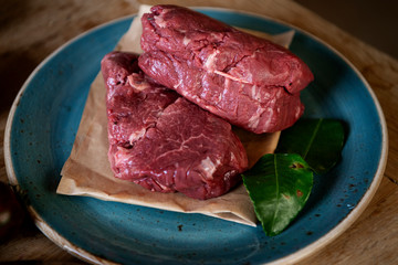 Raw beef on a plate food photography recipe idea