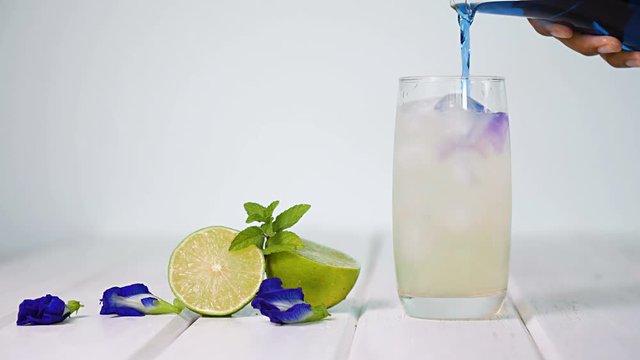 Butterfly pea flower drink with lime ,the  honey and mint leaf , fresh herbal healthy detox drink