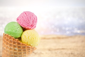 Scoops of ice cream  on background