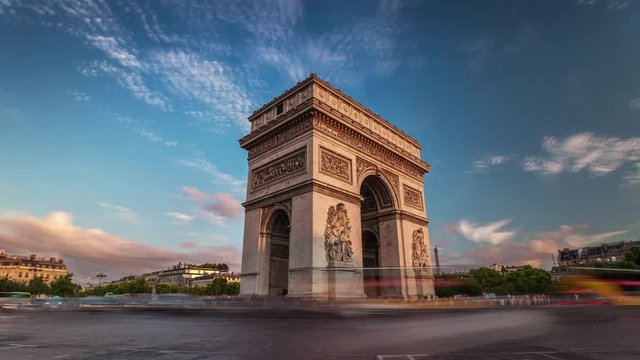 Beautiful sunset over Arc de Triomphe. Paris, France. Timelapse