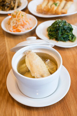 Cup of steamed chicken wing soup - chinese cuisine