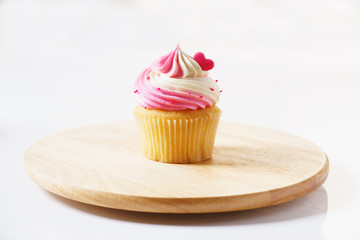 cupcake on wooden tray