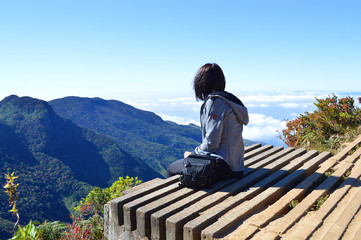 girl enjoying the view on the observation deck of Horton plains