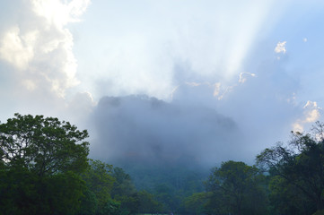 the view of the beautiful Sigiriya early in the misty morning