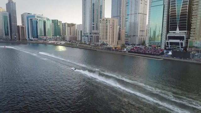 SHARJAH, U.A.E - DECEMBER 15 2017: Aerial view of speedboats during the race in Khalid lake in Sharjah, U.A.E.