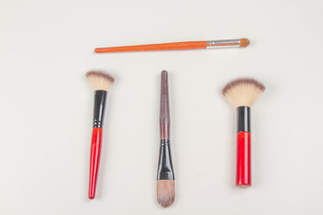 Set of decorative cosmetics on light colorful background