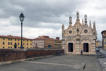 PISA, ITALY - OCTOBER 29, 2018: Chiesa di Santa Maria Della Spina next to the Arno river