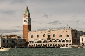 Fototapeta na wymiar VENICE, ITALY- OCTOBER 30, 2018: St Mark's Campanile is the bell tower of St Mark's Basilica in Venice, Italy, located in the Piazza San Marco. 