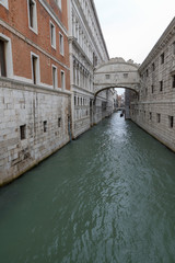 Fototapeta na wymiar VENICE, ITALY- OCTOBER 30, 2018: The Bridge of Sighs. The enclosed bridge passes over the Rio di Palazzo, and connects the New Prison to the interrogation rooms in the Doge's Palace.