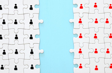 image of puzzle with people icons over wooden table ,human resources and management concept.