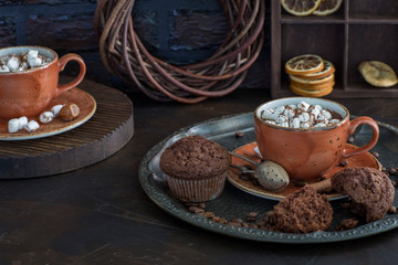 cup of coffee and cookies on table