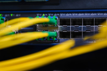 Network Switch and ethernet cables. Information Technology Computer Network