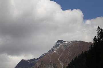 View of mountain and clouds in kashmir