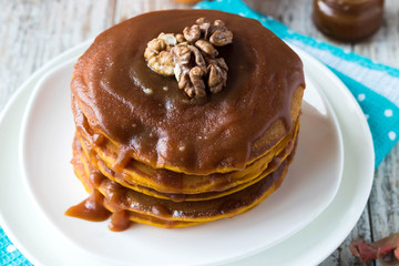 Spicy pumpkin pancakes with salted caramel topping
