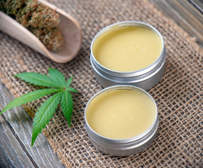 Cannabis hemp creams with marijuana leaf and nugs