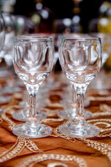 Glass glasses stand on a buffet table