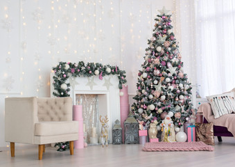 Christmas and New Year decorated pink interior room with presents and New year tree
