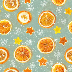Christmas background of dried oranges, orange peel in the shape of a star. Seamless background