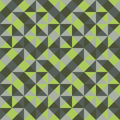 Abstract seamless pattern of triangles. Pleasant combination of green shades.