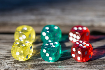 colorful dice isolated on wooden table