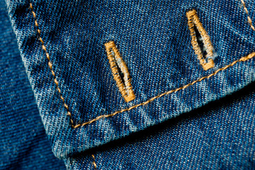 Textured blue denim texture stitched with a button-up texture