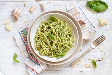 Spaghetti pasta with pesto sauce