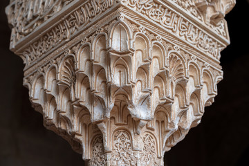 carved wall decoration in the castle of Alhambra, Spain