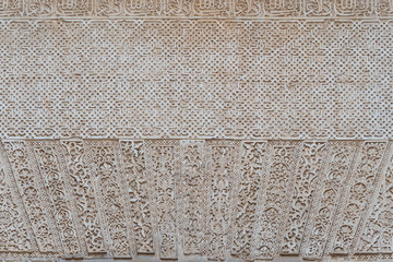 carved wall decoration in the castle of Alhambra, Spain