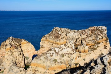 Elevated view of the cliffs with the ocean to the rear,  Ponta da Piedade, Lagos, Portugal.