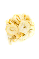 Soft dried apple disks isolated over white